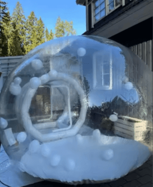 White inflatable bubble house filled with balloons – unique party attraction in the Espoo, Uusimaa, Finland.