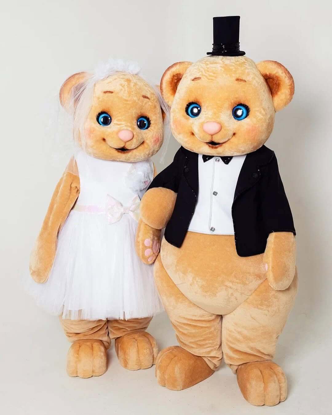 Wedding teddy bear mascots holding hands – perfect for themed events and photo in Espoo, Uusimaa, Finland.